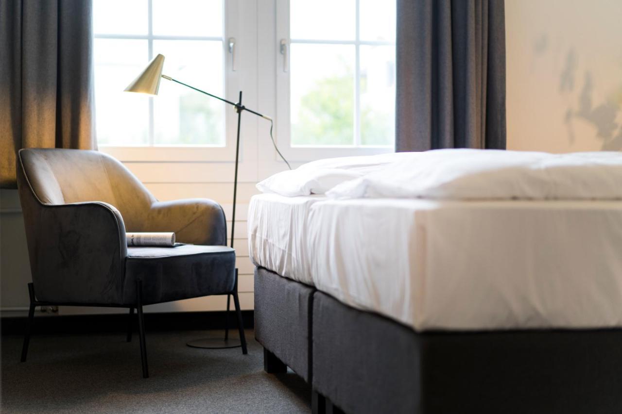 Koncept Hotel Loeie Мюнзинген Экстерьер фото