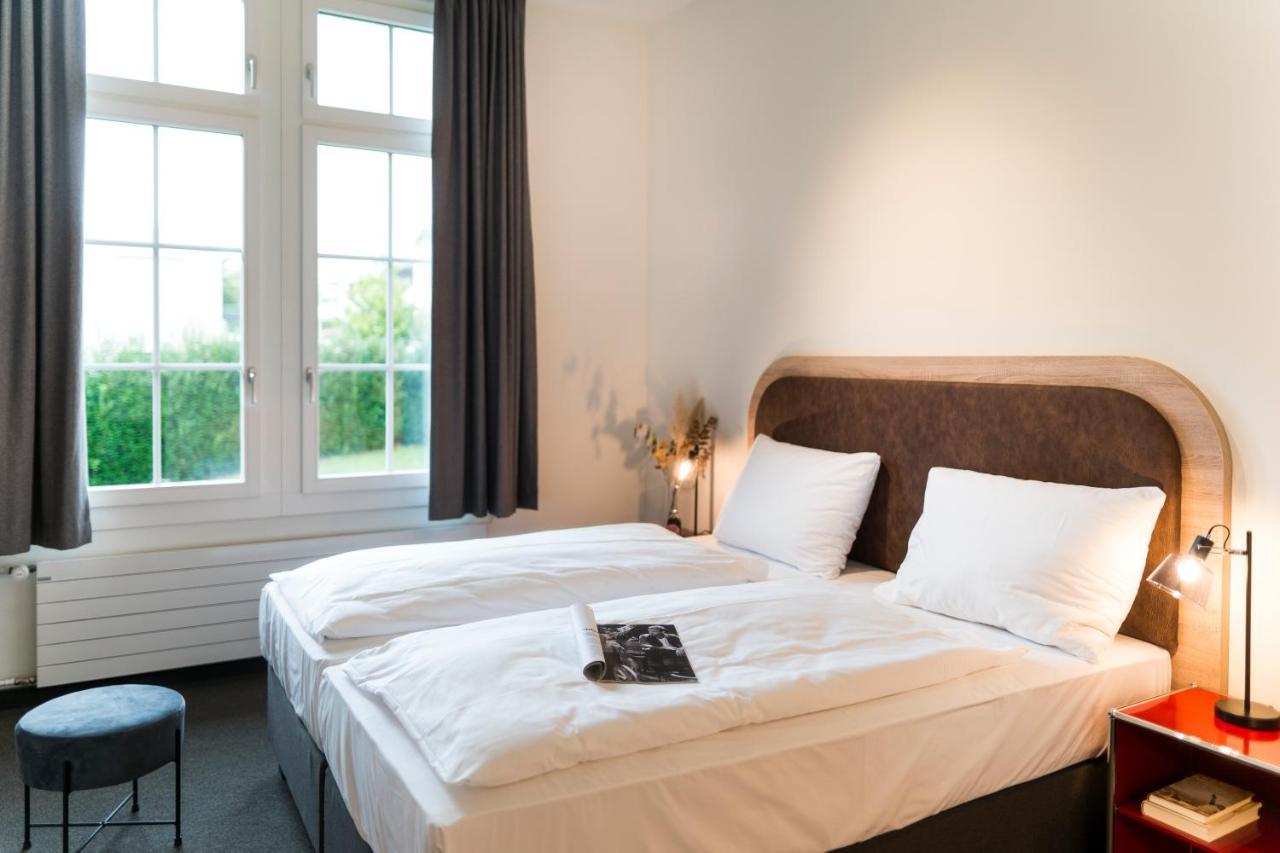 Koncept Hotel Loeie Мюнзинген Экстерьер фото