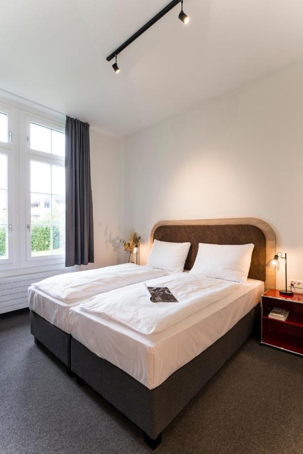Koncept Hotel Loeie Мюнзинген Экстерьер фото